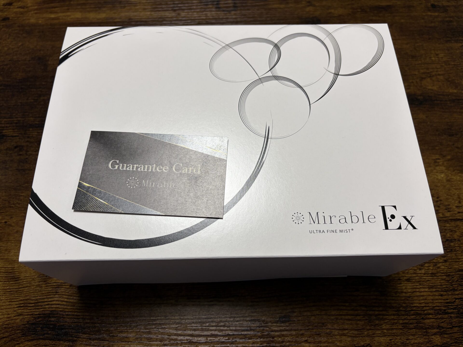 ミラブルExの化粧箱。Guarantee Card(正規品証明カード)が貼付されている
